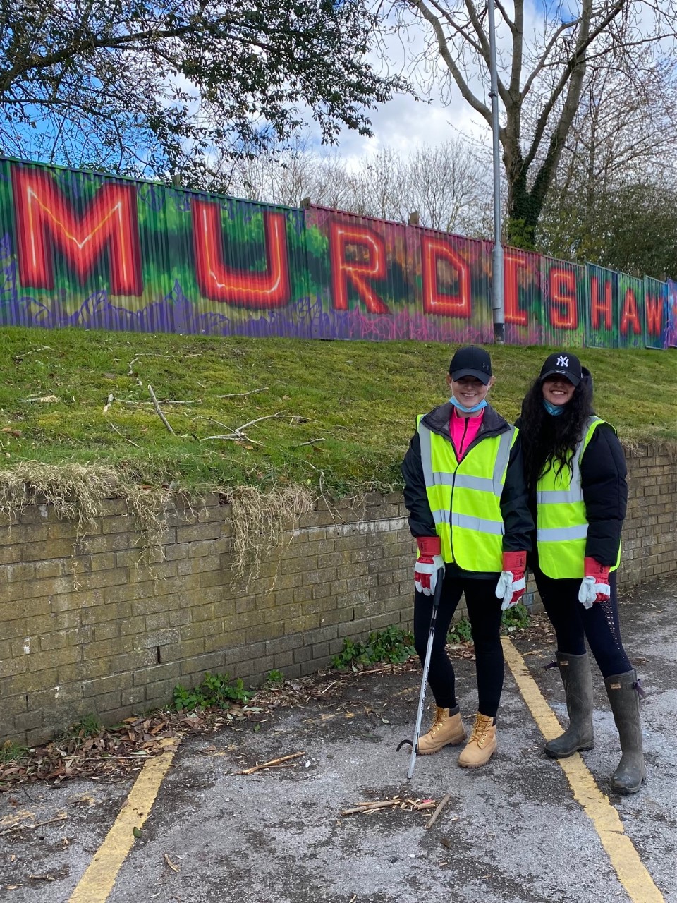 Community  members cleaning up Murdishaw