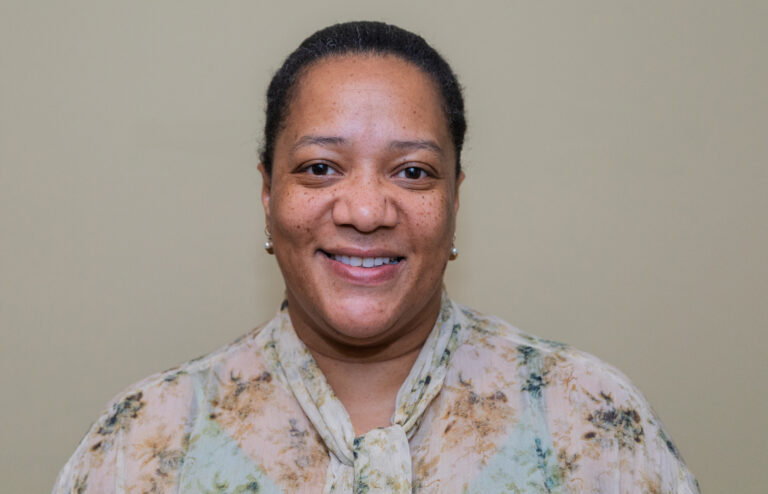 New Customer Board Member Tracy pictured in a patterned blouse as Riverside announces her appointment to the Board.