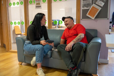 customer chatting to staff