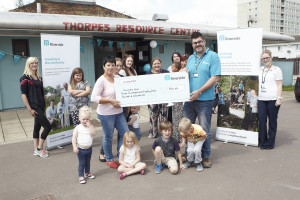 Lee Bailey (Riverside) presents a cheque to Maxine Antcliff