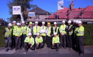 Mark Barron and the property services team celebrate his 25th work anniversary