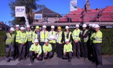 Mark Barron and the property services team celebrate his 25th work anniversary