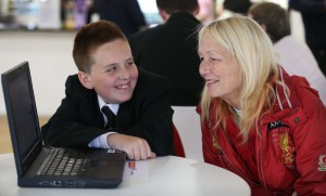 Youngsters from Gateacre School have been helping residents at Joseph Williams Mews to get online