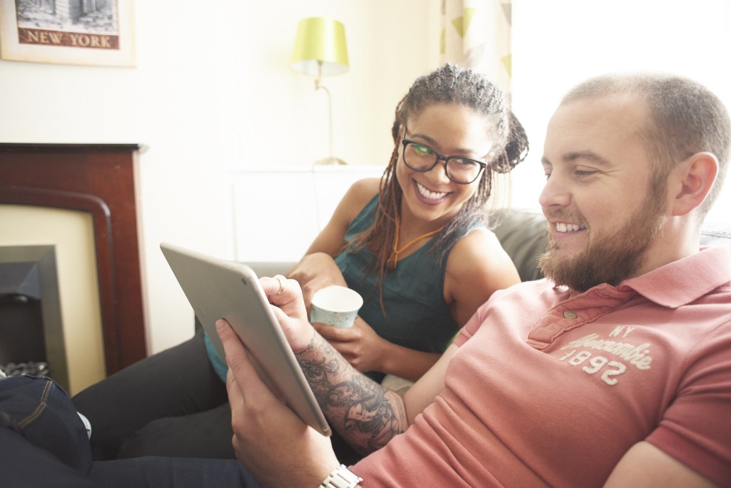 Couple using a tablet computer