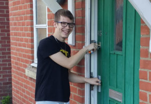 Phillip with the keys to his new flat