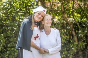 Riverside's Teri Constable in period costume, with Elizabeth Palin at Windsor Court, Bootle. Elizabeth's mum Catherine McCornick is a resident there.