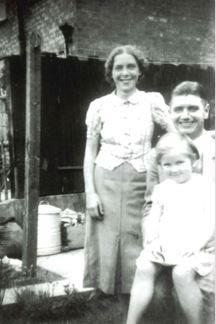 Nel (left) with her husband and daughter