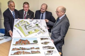 John Glenton Riverside Executive Director Care (3rd left) with Rochdale Cllrs from left Cllr Daalat Ali Cllr. Phil Burke and Cllr. Billy Sheerin studying the new development off the plans