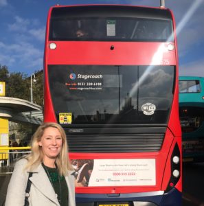 Riverside's Lorna Cotterill with the Stop Loan Sharks bus campaign.