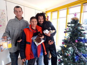 Jamie, Coleen and Scott at Open House Plus with their donations from St Joseph's Primary in Doncaster.