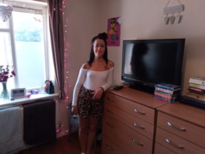 Riverside customer Sharmaine with her new TV at Centenary House which has been donated by the Friends of Duffield Homeless Group to help them self-isolate.
